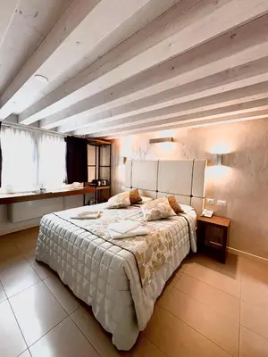 Letto o letti in una camera di Al Canal Regio - Guest House