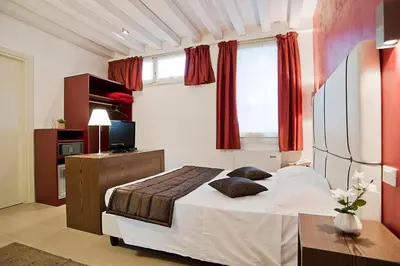 Letto o letti in una camera di Al Canal Regio - Guest House