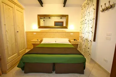 Letto o letti in una camera di La Brenta Vecchia