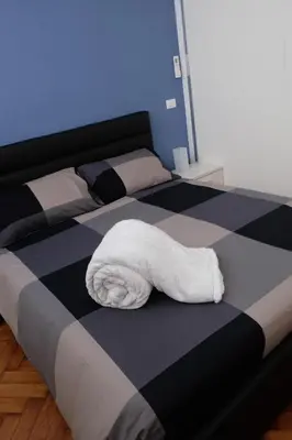 Letto o letti in una camera di Altinate33