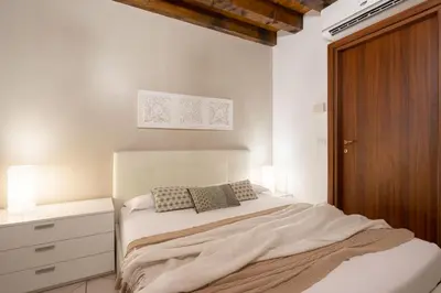 Letto o letti in una camera di Design Palace Apartment by Wonderful Italy