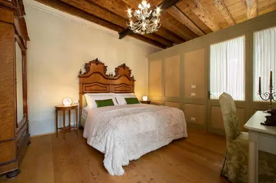 Letto o letti in una camera di Villa Premoli - Agriturismo di charme