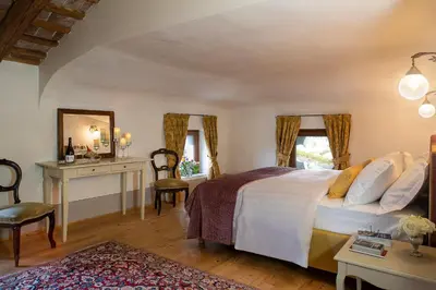 Letto o letti in una camera di Villa Premoli - Agriturismo di charme