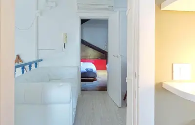 Letto o letti in una camera di Mariangela Art Lodge