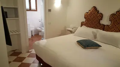 Letto o letti in una camera di Ca' Mariele