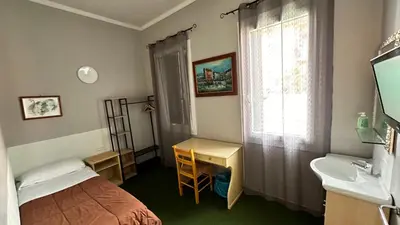 Letto o letti in una camera di Nuova Locanda Belvedere