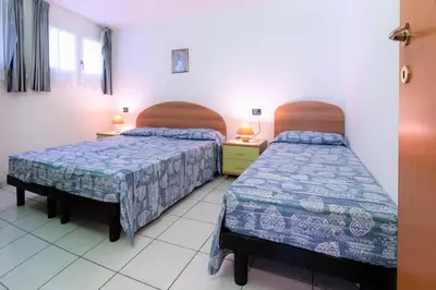 Letto o letti in una camera di Al Parco 2