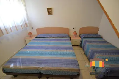 Letto o letti in una camera di Villa Sofia