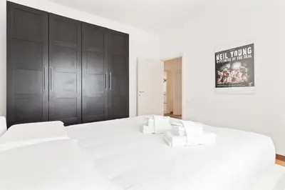 Letto o letti in una camera di GuestHost - Santa Rita Roomy Apartments