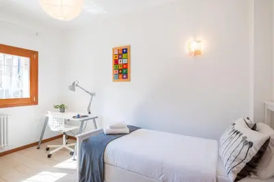 Letto o letti in una camera di GuestHost - Santa Rita Roomy Apartments