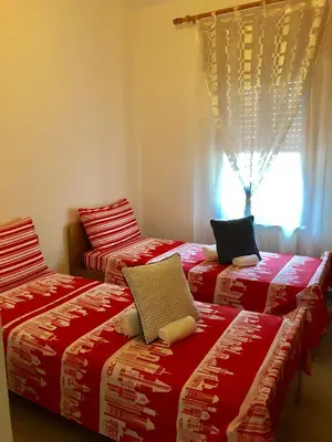 Letto o letti in una camera di Casa Giulia