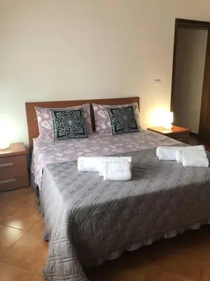 Letto o letti in una camera di Casa Giulia
