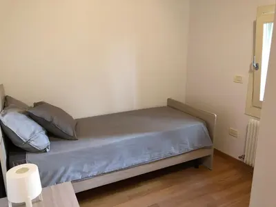 Letto o letti in una camera di Interno 1
