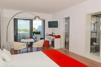TV o dispositivi per l'intrattenimento presso Stay Michelangelo Jesolo Only Adults