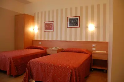 Letto o letti in una camera di Hotel Belie