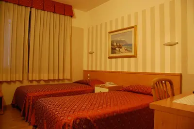 Letto o letti in una camera di Hotel Belie