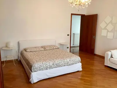 Letto o letti in una camera di Casa Mamma Mia