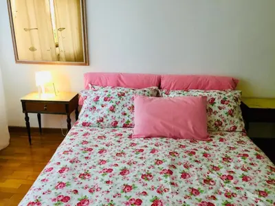 Letto o letti in una camera di Casa Mamma Mia