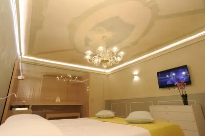 Letto o letti in una camera di CA' XXII MARZO BOUTIQUE