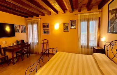 Letto o letti in una camera di San Cassiano jacuzzi