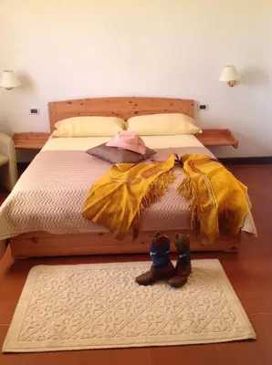 Letto o letti in una camera di Agriturismo Ai Gradoni