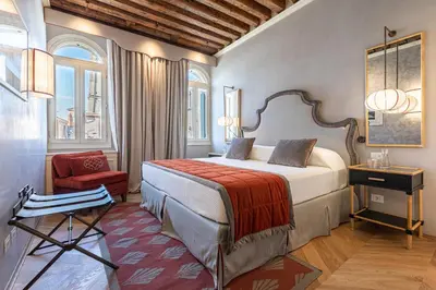 Letto o letti in una camera di La Dimora di San Maurizio 3- Dimora Italia -