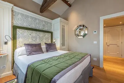 Letto o letti in una camera di La Dimora di San Maurizio 4 Terrace - Dimora Italia -