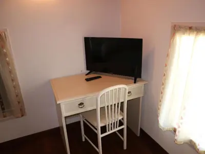TV o dispositivi per l'intrattenimento presso B&B Primula House