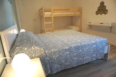 Letto o letti in una camera di Holiday House