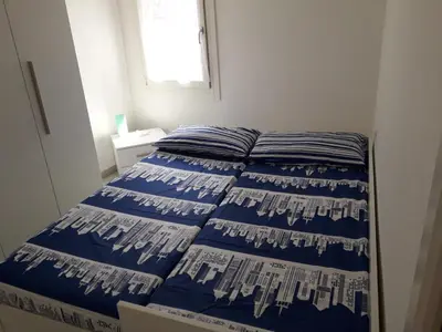 Letto o letti in una camera di ANGOLO DI LUCE