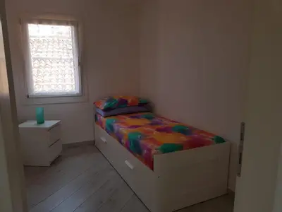 Letto o letti in una camera di ANGOLO DI LUCE