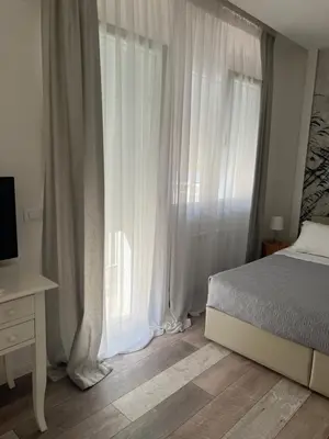 Letto o letti in una camera di Residenza Ca’ Vittoria