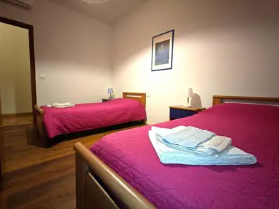 Letto o letti in una camera di LAURA APARTMENT VENICE 4 P. 15 M TO VENICE
