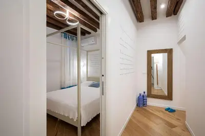 Letto o letti in una camera di Privacy in Venice - Your apartment to be let alone