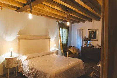 Letto o letti in una camera di la restera del Sile B&B