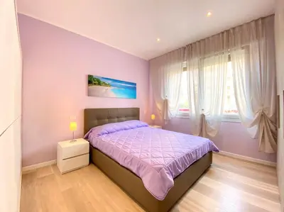 Letto o letti in una camera di Appartamenti Palladio - Carraro Immobiliare - Family Apartments