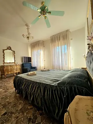 Letto o letti in una camera di Cà ARIVANLIAL Venice villa apartament