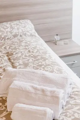 Letto o letti in una camera di INTERO APPARTAMENTO nel cuore di VICENZA