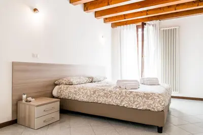 Letto o letti in una camera di INTERO APPARTAMENTO nel cuore di VICENZA