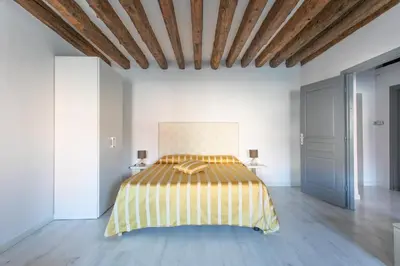 Letto o letti in una camera di Canaletto Apartment Rialto