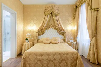 Letto o letti in una camera di Canal View San Marco Luxury Rooms