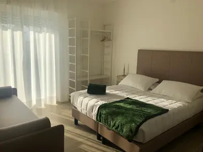 Letto o letti in una camera di Sole&Luna - Rooms