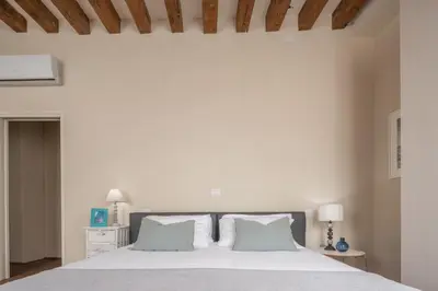 Letto o letti in una camera di Santa Fosca Design Apartment R&R