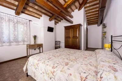 Letto o letti in una camera di La Tenuta Va Oltre