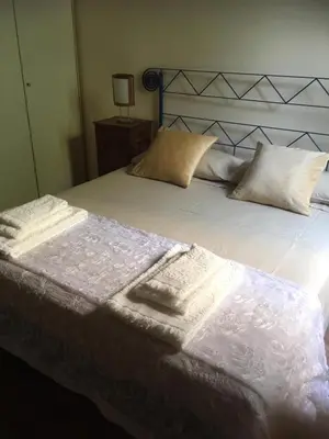 Letto o letti in una camera di DIMORA CECILIA, nel cuore della città