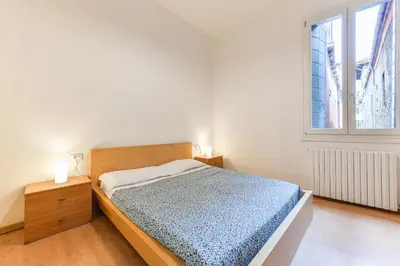 Letto o letti in una camera di La Bauta