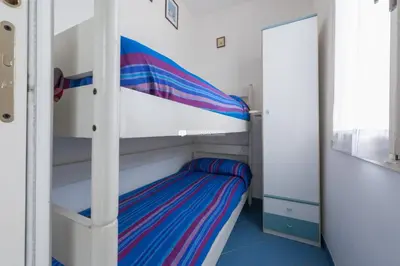 Letto o letti in una camera di Residence Puerto Del Sol Immobiliare Pacella