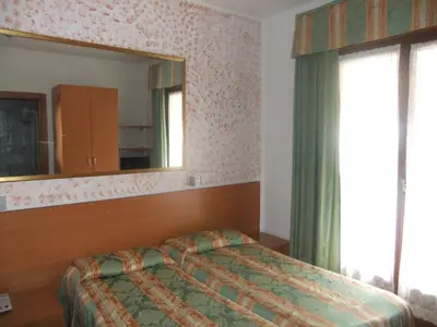 Letto o letti in una camera di Hotel Da Bepi