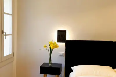 Letto o letti in una camera di Villa De' Giacomi
