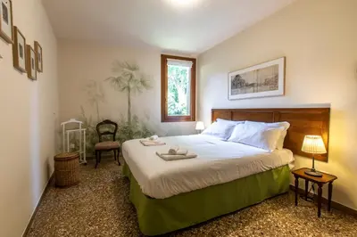 Letto o letti in una camera di Riva De Biasio Charming Apartment